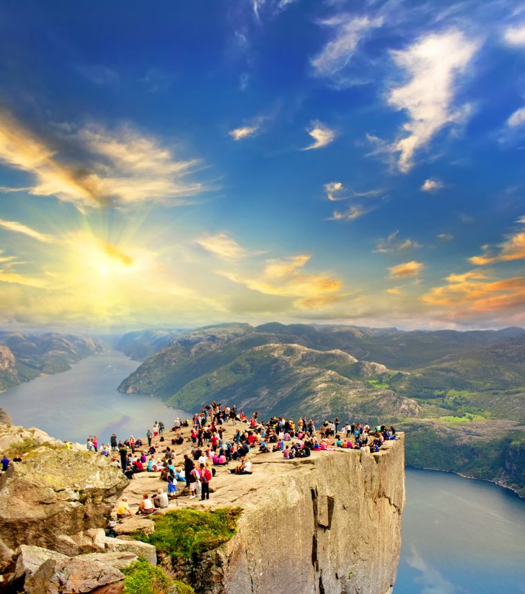 People on the Preikestolen at sunset, Pulpit Rock, Norway
