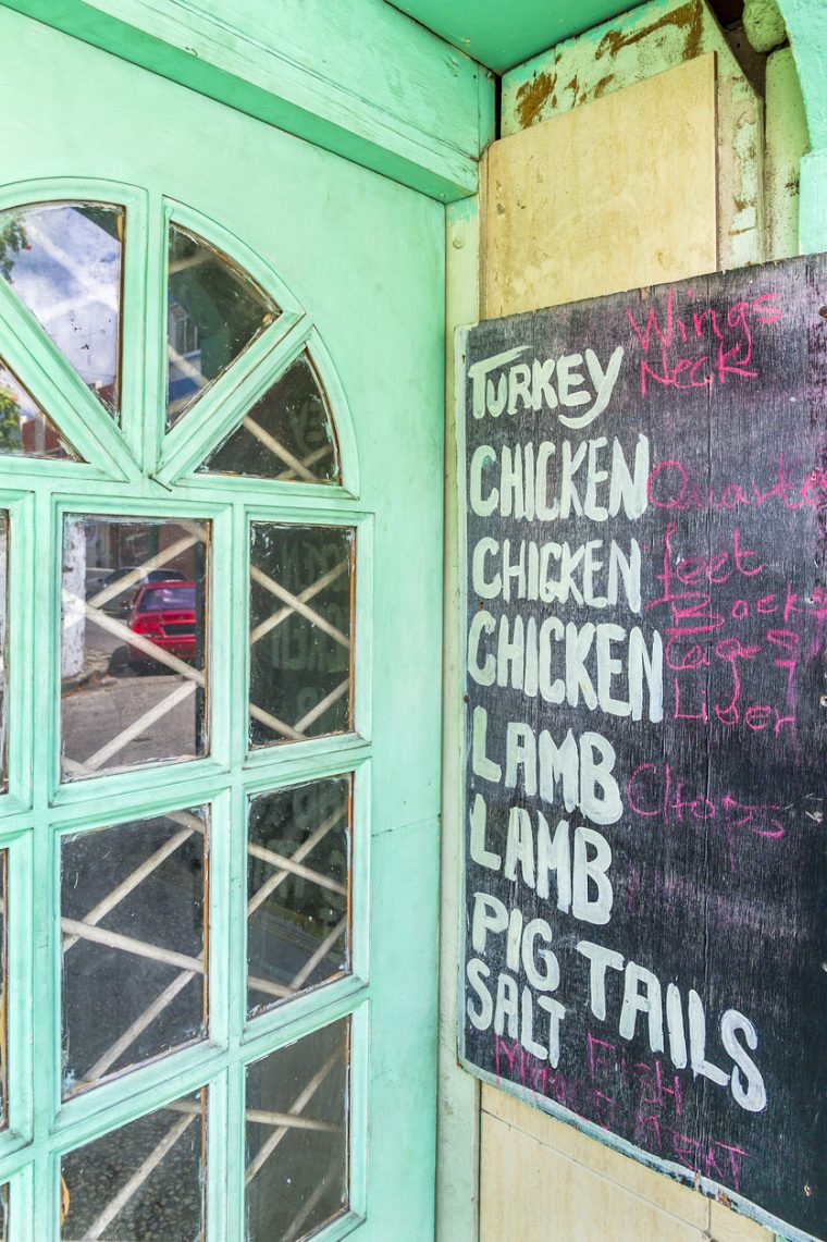 "Menu board out of a restaurant in Bridgetown, the capital city of Barbados."
