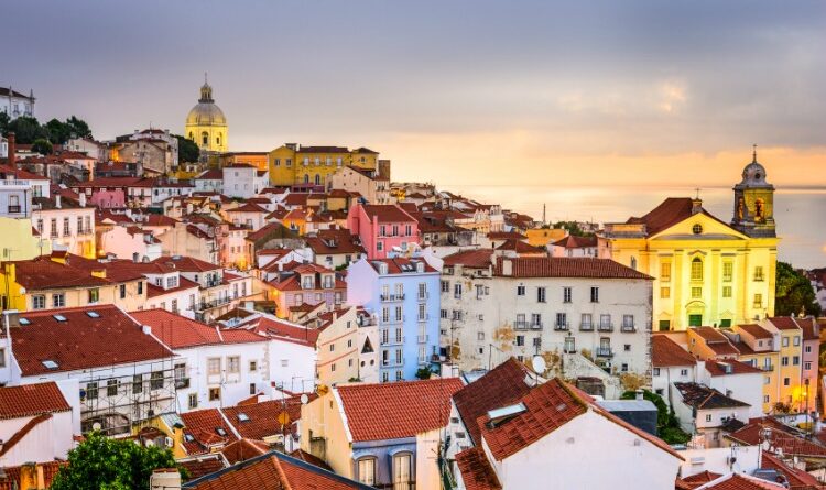 Lisbon, Portugal cityscape at the Alfama district at dawn.