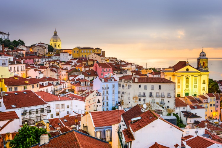 Lisbon, Portugal cityscape at the Alfama district at dawn.