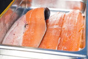 Fresh fish on deck, Fileting of salmon on deck