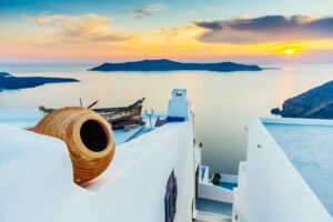 Sunset on Santorini and view of volcanic caldera, Santorini, Cyclades, Greece