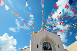 Cozumel, Colorfull flag on blue sky background