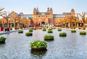 Rijksmuseum and people in front of writing, I amsterdam, Museumplein, Holland