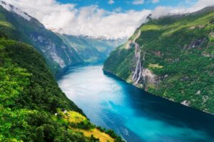 Breathtaking view of Sunnylvsfjorden fjord and famous Seven Sisters waterfalls, near Geiranger village in western Norway