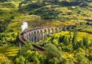Glenfinnan Railway Viaduct in Scotland with the Jacobite steam train passing over