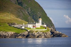 Beautiful lighthouse and buildings on the island of Bressay in the Shetland Islands in Scotland.